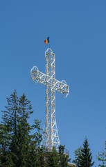 Obraz premium The large metal cross from the Piatra Fântânele Monastery, in the area of Tihuţa Pass, Bistrita, Romania, 2020,