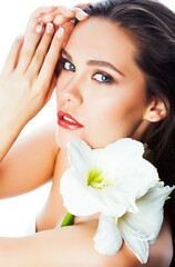 Fototapeta premium young pretty woman with Amarilis flower closeup isolated on white macro