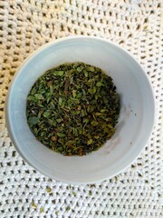 dried oregano in a bowl