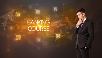 Businessman with shopping cart icons and BANKING COURSE inscription, online shopping concept