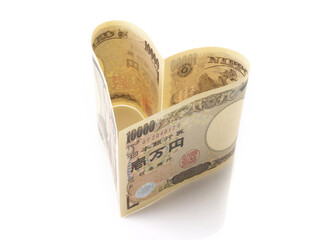 Obraz premium ハートの一万円札（日本円の紙幣）