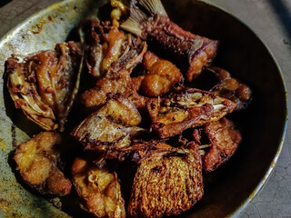 This is the typical indian style fish fry at a rural restaurant.