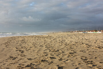 by the sea on the sandy beach of an Italian beach establishment in Versilia, Tuscany