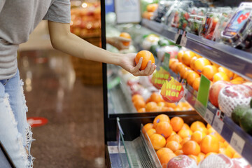 Asian woman shopping in supermarket