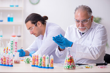 Two chemists working in the lab