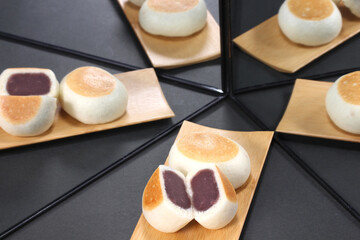 鏡に映る葬式饅頭