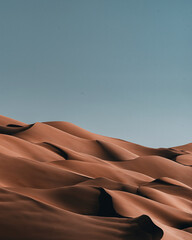 Fototapeta na wymiar Moreeb Dune or Tal Moreeb (تل مرعب Mor'ib Hill) is a large sized sand dune located in proximity of Liwa Oasis at the Empty Quarter desert in the United Arab Emirates. 