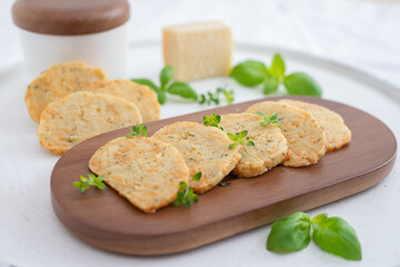 home made cheese crackers with herbs on a table