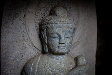 Fototapeta na wymiar 石の仏像