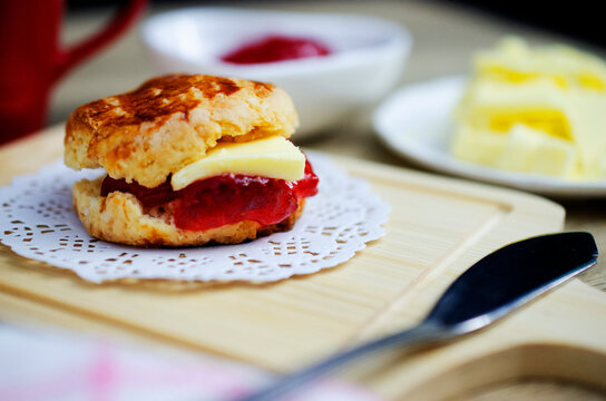 Close up of sigle scone homemade on wooden plate backgrounds for dessert food