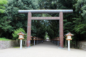 Torii Shinto gate and toro lighting equipment of Miyazaki Jingu Shrine.