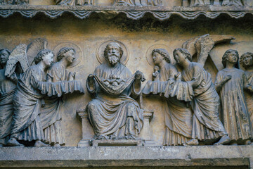 View of the exterior facade of the Roman Catholic Notre Dame de Reims Cathedral, a historical...
