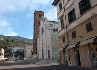 Fototapeta na wymiar The ancient medieval tower of Pietrasanta, a town of art in Tuscany.