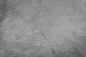 Naklejka premium Abstract background of modern loft cement texture. The gray concrete wall has some scratch without a fixed pattern. Can be used in graphic design and for creating various backgrounds.