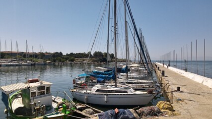 Fototapeta premium Drone shot over a marina in Thessaloniki, Greece during summer