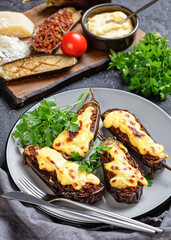 Greek papoutsakia with bechamel sauce on top