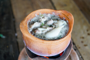 the soil hotpot with some food in the pot