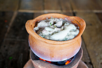 the soil hotpot with some food in the pot