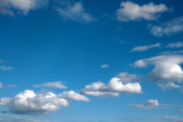 Fototapeta na wymiar Aerial photo. View of the white clouds against the blue sky.