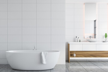 Naklejka na ściany i meble White bathroom with tub and sink
