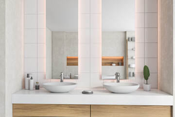 Double sink and mirrors in white bathroom