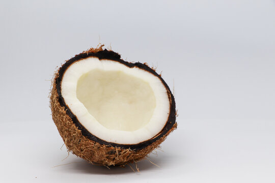Coconut isolated on the white background, Halved coconut on a white background