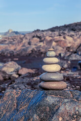 Fototapeta na wymiar Balance Stack Of Pebble At British Beach