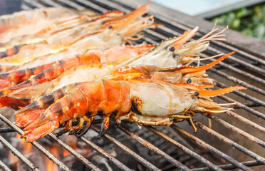 Grilled shrimps on the Charcoal Stove Grate.
