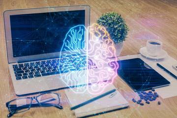 Fototapeta na wymiar Double exposure of desktop with computer and brain drawing hologram. Artificial intelligence concept.