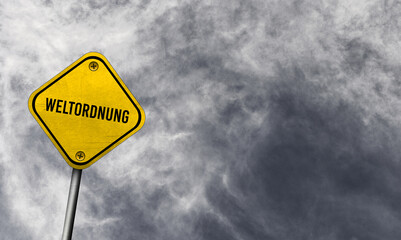 Yellow weltordnung sign with cloudy background
