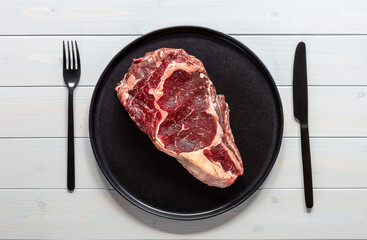 Raw beef rib eye steak. Organic farm meat.