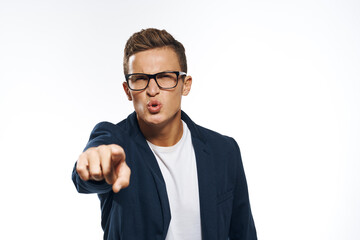 Fototapeta premium Business man in a jacket with glasses emotions official manager light background studio