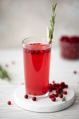 lingonberry juice with honey in glass