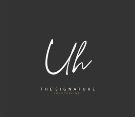U H UH Initial letter handwriting and signature logo. A concept handwriting initial logo with template element.