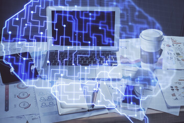 Multi exposure of work space with computer and human brain hologram. Brainstorm concept.