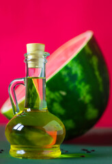Watermelon seed oil in a glass jar