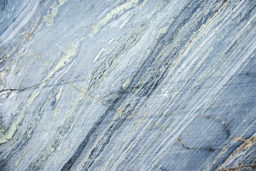 Real faceted marble stone. Background, texture.