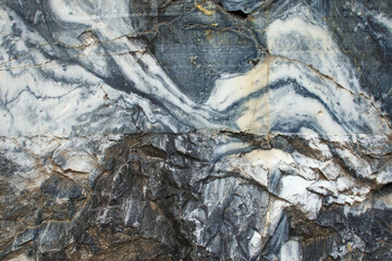 Real faceted marble stone. Background, texture.
