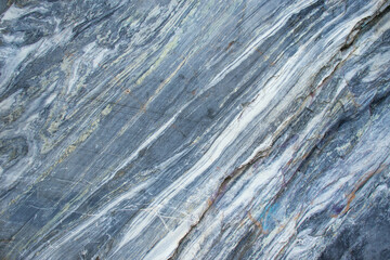 Real faceted marble stone. Background, texture.