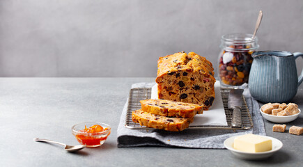 Fruit cake Bara Brith. Welsh traditional dessert. Grey background. Copy space.
