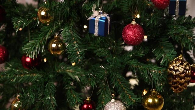 Christmas tree with presents under the christmas tree.