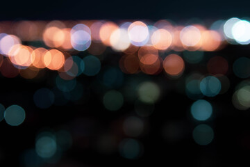 abstract background with bokeh defocused lights from cityscape at night