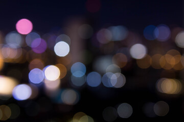 abstract background with bokeh defocused lights from cityscape at night