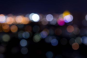 abstract background with bokeh defocused lights from cityscape at night