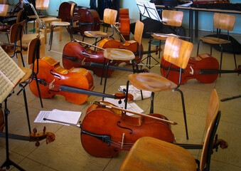 Group of cellos during rehearsal pause