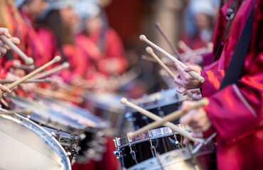 close-up of hands playing the drum during easter