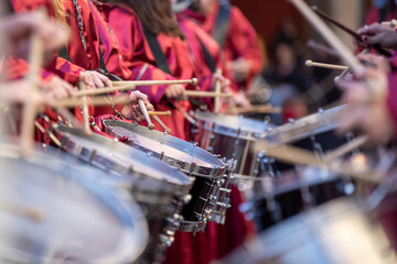 close-up of hands playing the drum during easter