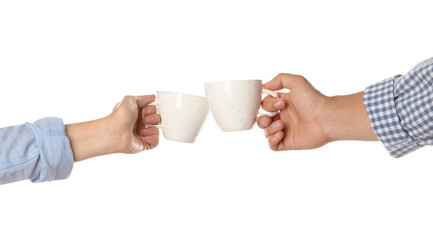 Women clinking cups on white background, closeup