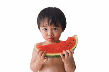 Cute little Asian boy eating watermelon on white background