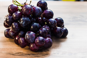grapes on a wooden table